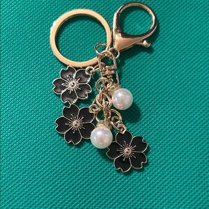 Elegant Black Floral Keychain with Pearls